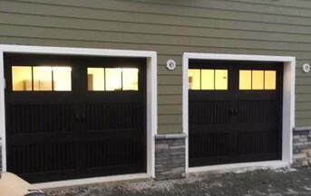 Wayne Dalton Bead board steel garage door in dark walnut with large rectangular windows