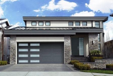 Long Raised Panel Gray Garage Door With Two Columns of Glass