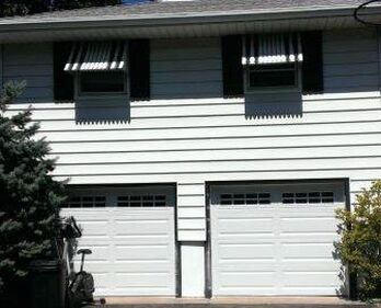 Raised long panel garage door in white with long windows