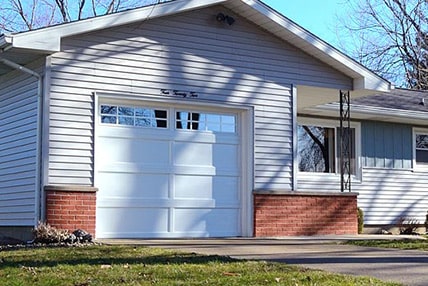 Long panel steel recessed garage door with stockton windows